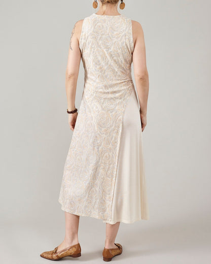 Back view of Fine Thee asymmetric midi dress, showcasing the beautiful rose-patterned floral jacquard silk back and elegant drape.