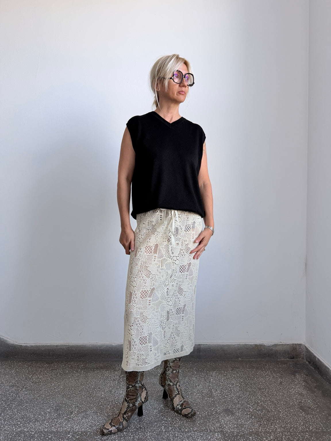 Cream sheer wool openwork midi skirt front view on model