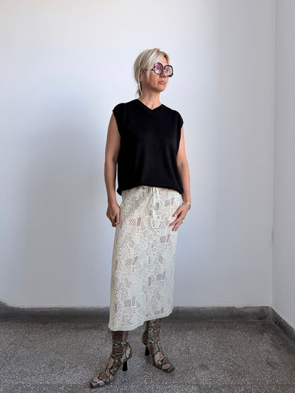 Cream sheer wool openwork midi skirt front view on model
