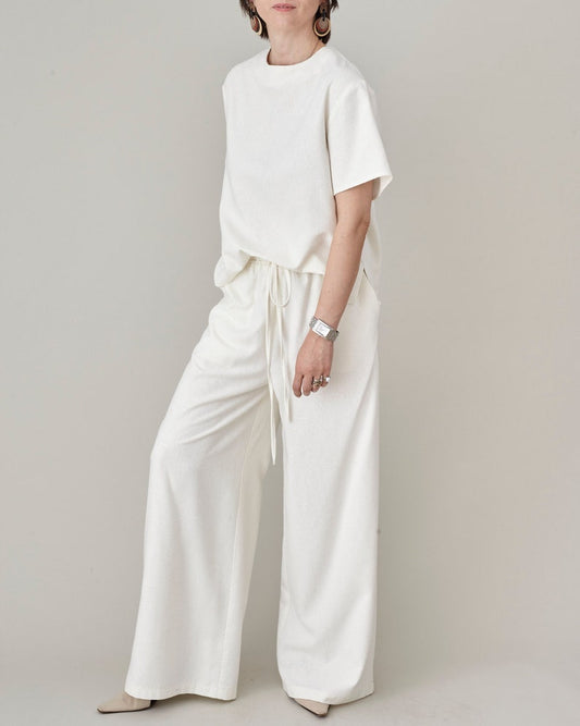 Handcrafted 100% raw silk wide-leg pants in natural ivory white with comfortable elastic waistband by Fine Thee`