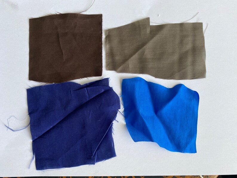 Silk fabric color swatches in brown, taupe, navy and bright blue.