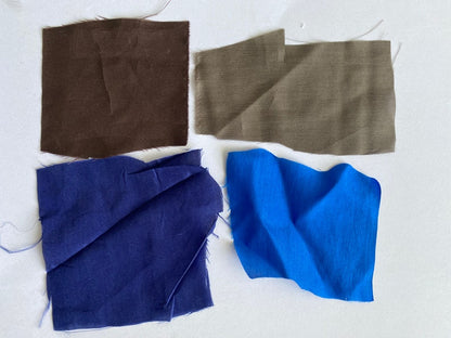 Silk fabric color swatches in brown, taupe, navy and bright blue.