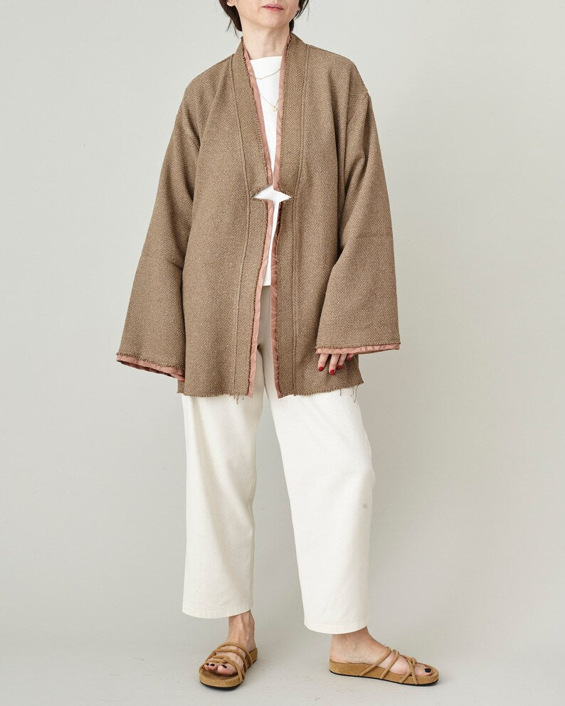 Ivory raw silk tapered trousers styled with a taupe open-front kimono jacket and tan sandals, handmade by Fine Thee