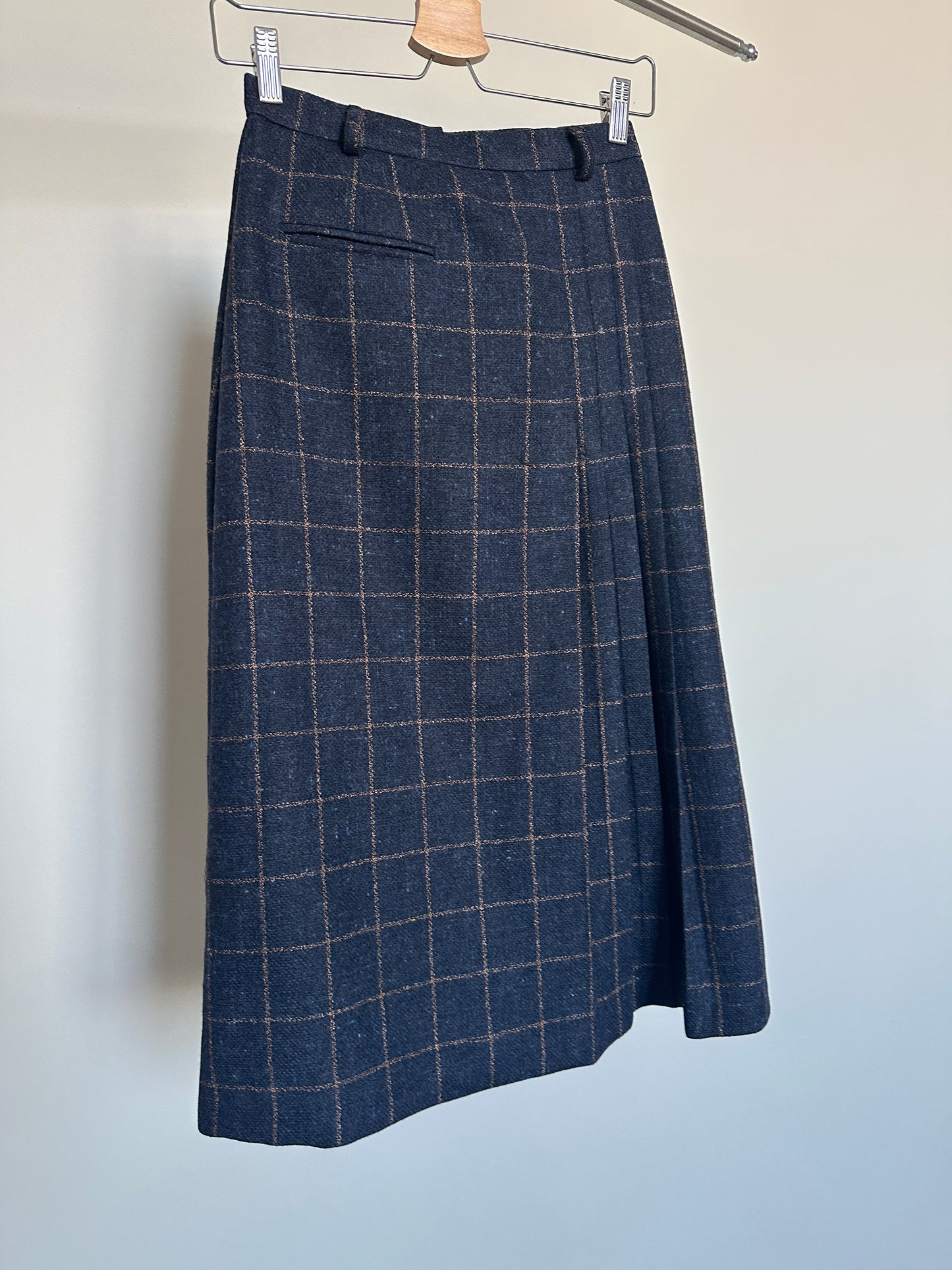 plaid navy skirt on hanger