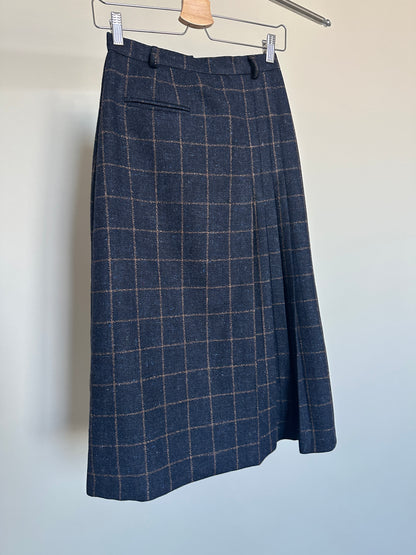 plaid navy skirt on hanger